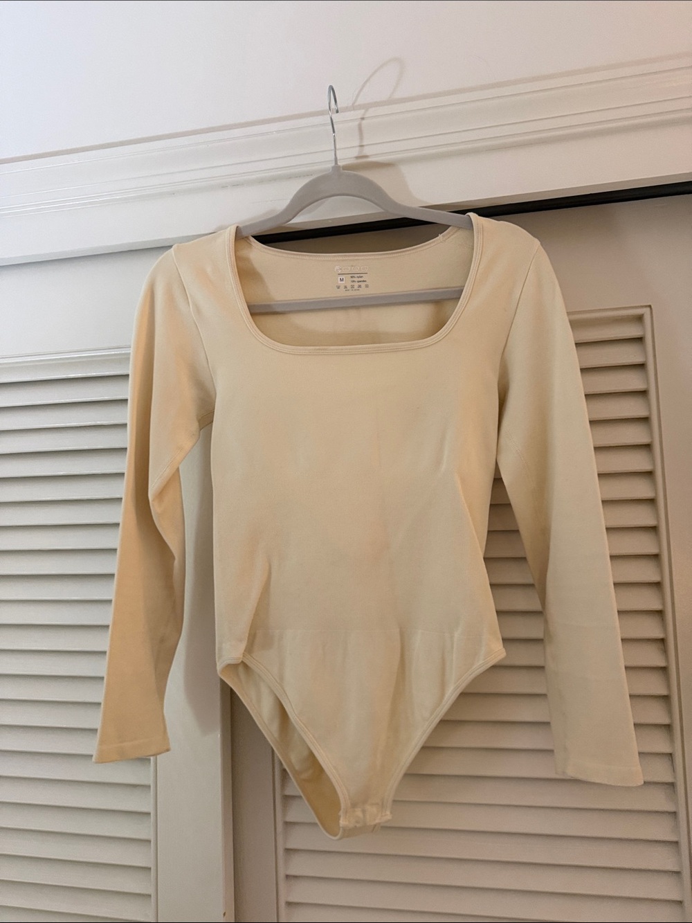 Cream Long-Sleeve Scoop Neck Bodysuit – Classic Stretch Fit